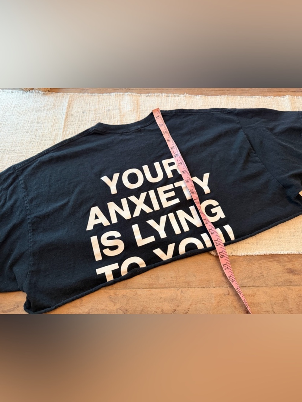Black Graphic Tee with Bold White Text - 'Your Anxiety Is Lying To You'